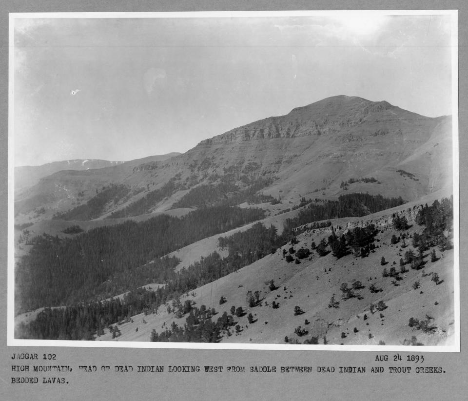 black and white photo of mountains and valleys