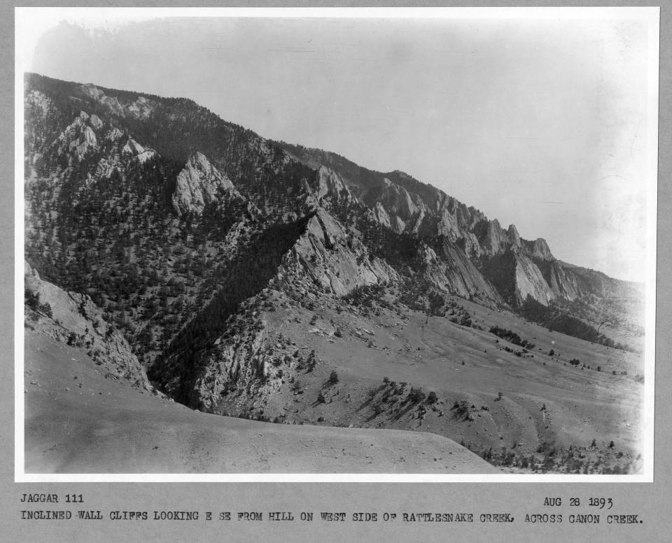 black and white photos of rugged rock faces beyond a deep canyon cleft