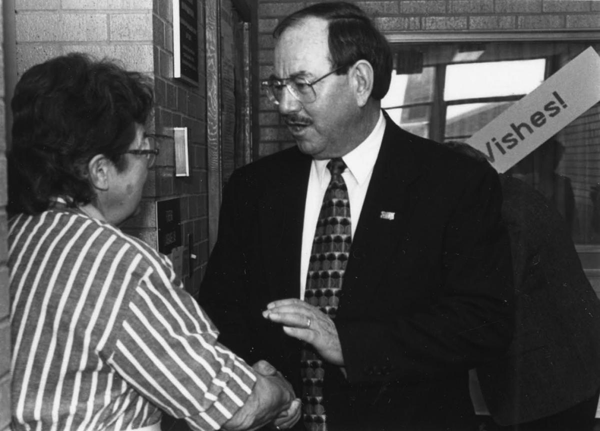 Casper College English Instructor Arlene Larson, left, with CC President LeRoy Strausner, June 1997. Casper College Western History Center.
