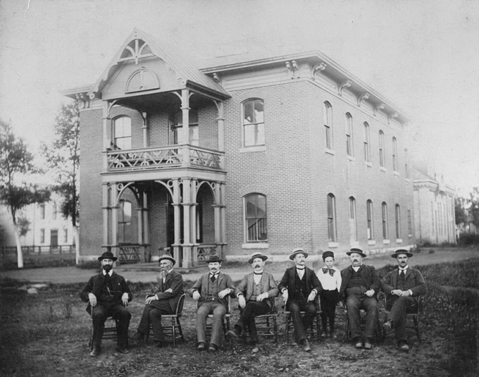 The Uinta County Courthouse about 1900, with some of its regular occupants. Wyoming State Archives.