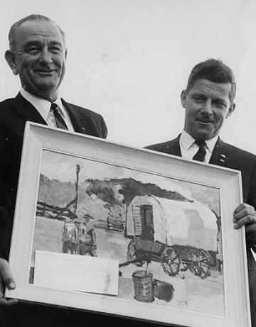 Campaigning together in Casper in 1964, President Lyndon Johnson and Wyoming&#039;s U.S. Senator Gale McGee admire a painting of a sheep wagon--a testament to the sheep industry&#039;s staying power in Wyoming politics.