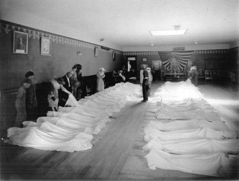 Townspeople identifying bodies after the 1923 coalmine disaster, Kemmerer, Wyo. American Heritage Center.
