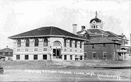 NIobrara County's courthouse, (rear) and Carnegie Library, about 1920. Wyoming Tales and Trails.