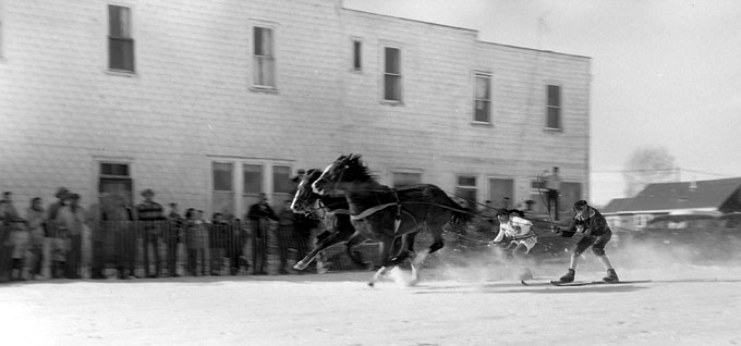 Ski-joring on Maybell Avenue in Pinedale, 1959. Paul Allen photo.