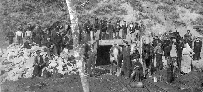 Coal miners and horses at the mouth of the Monarch Mine north of Sheridan, about 1903. Sheridan County Museum.