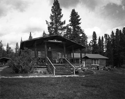 The porch and extended gable roof on the T Cross Ranch lodge are typical of the ranch&apos;s historic buildings. Wyoming SHPO photo.