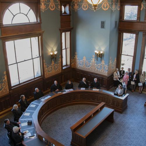 View looking down at the Wyoming Supreme Court justices seated in the restored room