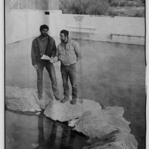 Saratoga Mayor Dave Pennock (right) and Burt Widmer (left) stand on the stonework around the “Lobster Pot” at the Hobo Pools, circa 1982. Courtesy Saratoga Museum, P1986.59.24.67.04.