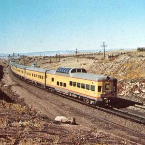 A domed lounge car on the UP's "City of Los Angeles" as it rolls across Wyoming in 1955. Wikipedia.