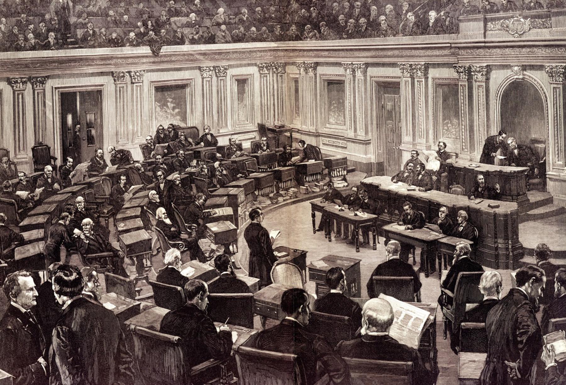 The U.S. Senate at work, January 1886. Plumb is sitting at his desk, just to the right of the two men talking in the bottom left corner. His face is in profile with his distinctive beard, and the back of his head is partly obscured by the man standing. Harper’s Weekly.