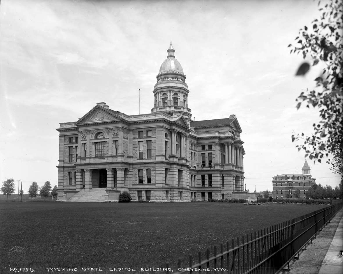 The Capitol around 1905, from the southwest corner of the grounds looking northeast. The dome, then and now, was made of copper gilded with gold leaf. J.E. Stimson photo, Wyoming State Archives.