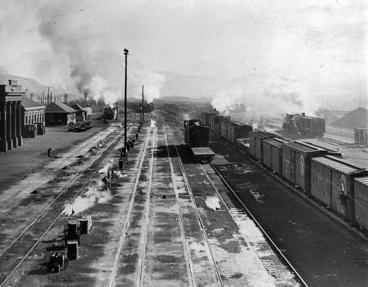 Coal-fired steam locomotives powered the Union Pacific Railroad for more than 80 years—and then, suddenly, they didn’t. Shown here, freight cars and switch engines in the rail yard at Green River, Wyo., 1930s. Sweetwater County Historical Museum.