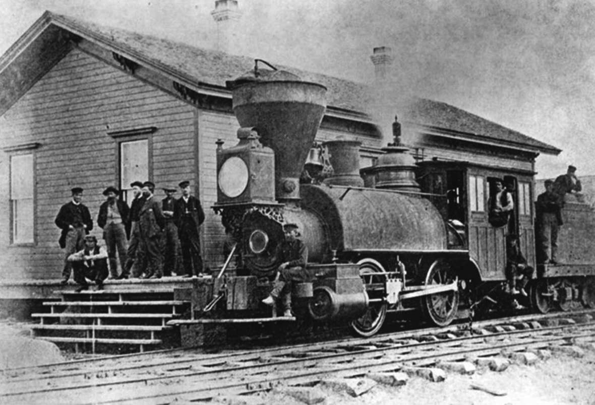 Anna Dickinson first stopped in Cheyenne in June 1869 when, traveling to San Francisco with a congressional committee, she stepped out on the depot platform for a breath of air. Shown here, the first locomotive to arrive in Cheyenne, 18 months earlier. Wyoming State Archives.