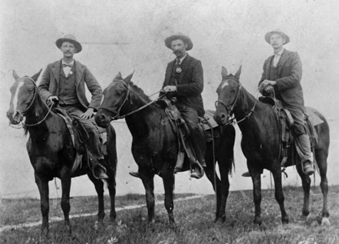 Longtime lawman Joe Davenport, above, left, and below, second from left, later found what is believed to be Bub Meeks’s rifle in Brown’s Hole, where Colorado, Wyoming and Utah meet. Davenport served as a deputy sheriff in Moffat County, Colo. and Sweetwater County, Wyo. before serving many years on the Rock Springs police force. The first photo is undated; the second from 1924. Uintah (Utah) County Library; Sweetwater County Historical Museum. 