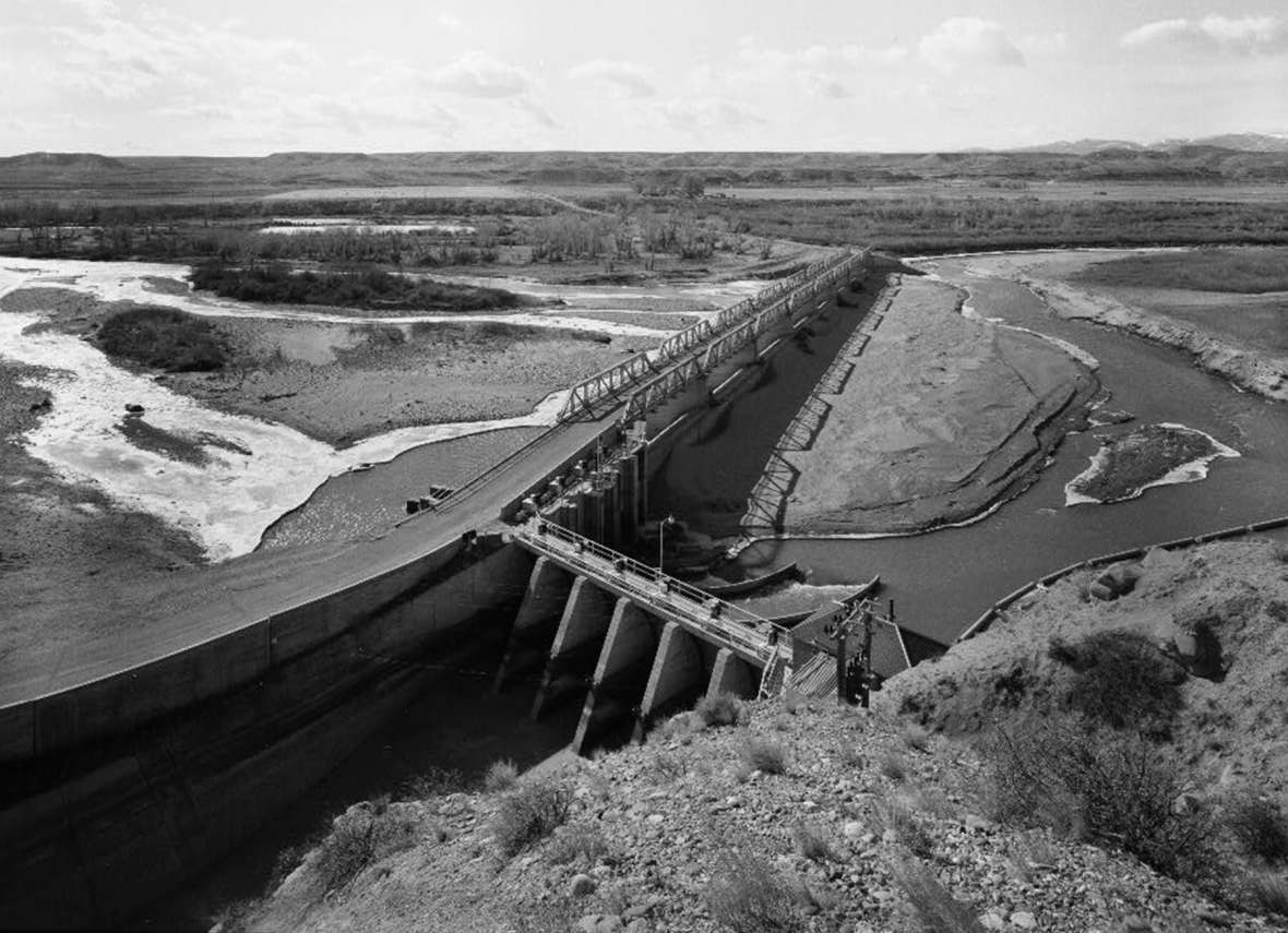 Built in 1923 to take water from the main stem of the Wind River for irrigators to the north, Diversion Dam was key to the U.S. Reclamation Bureau’s new Riverton Project, later called the Midvale Irrigation District. Library of Congress.