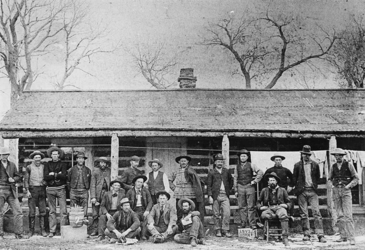 Pitchfork cowboys in front of the bunkhouse, late 1880s. Courtesy of the Meeteetse Museums.