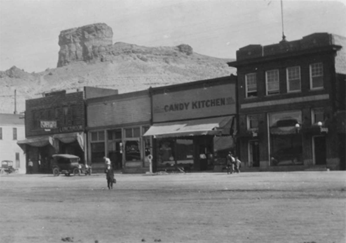 Customers in the Candy Kitchen April 1, 1933, may have been among the first to hear about the robbery next door at Green River's  First National Bank, on right. Sweetwater County Historical Museum.