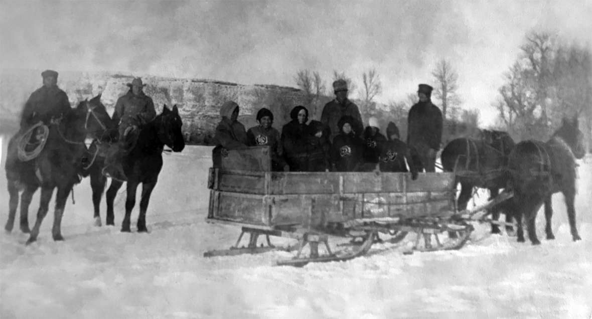 Stepp family members heading to the Green River, above, and below, cutting ice for the ice house, around 1920.  Stepp family photos.