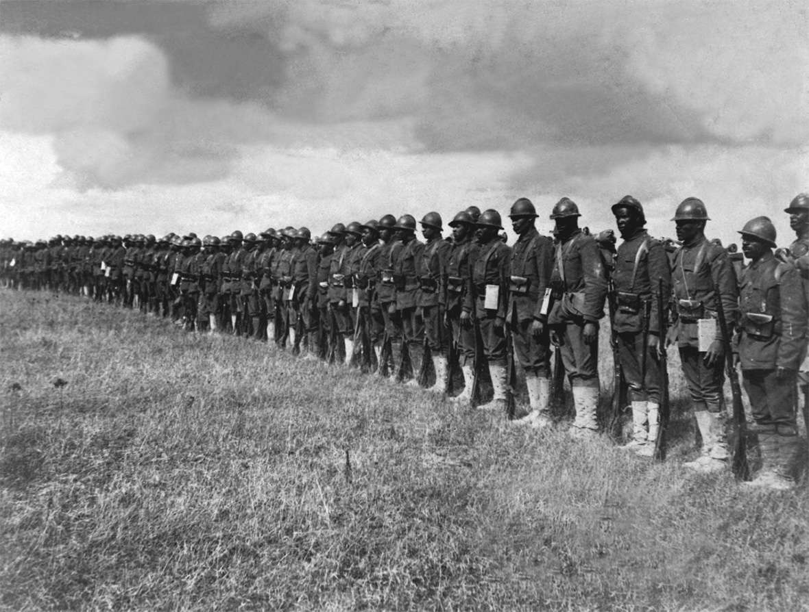 African-American troops in France, ca., 1918---wearing French infantry helmets. Wyoming Veterans Memorial Museum.