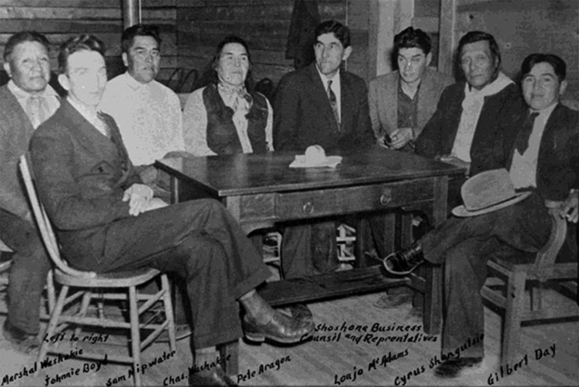 Shoshone Business Council members about 1940. Left to right, Marshall Washakie, Johnnie Boyd, Sam Nipwater, Charles Washakie, Pete Aragon, Lanjo McAdams, Cyrus Shogutsie, Gilbert Day. American Heritage Center.