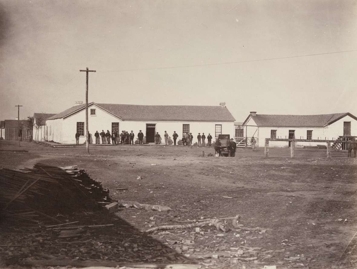 Buildings, people and telegraph poles, Fort Bridger, late 1860s. A.J. Russell. Beinecke Library, Yale. 
