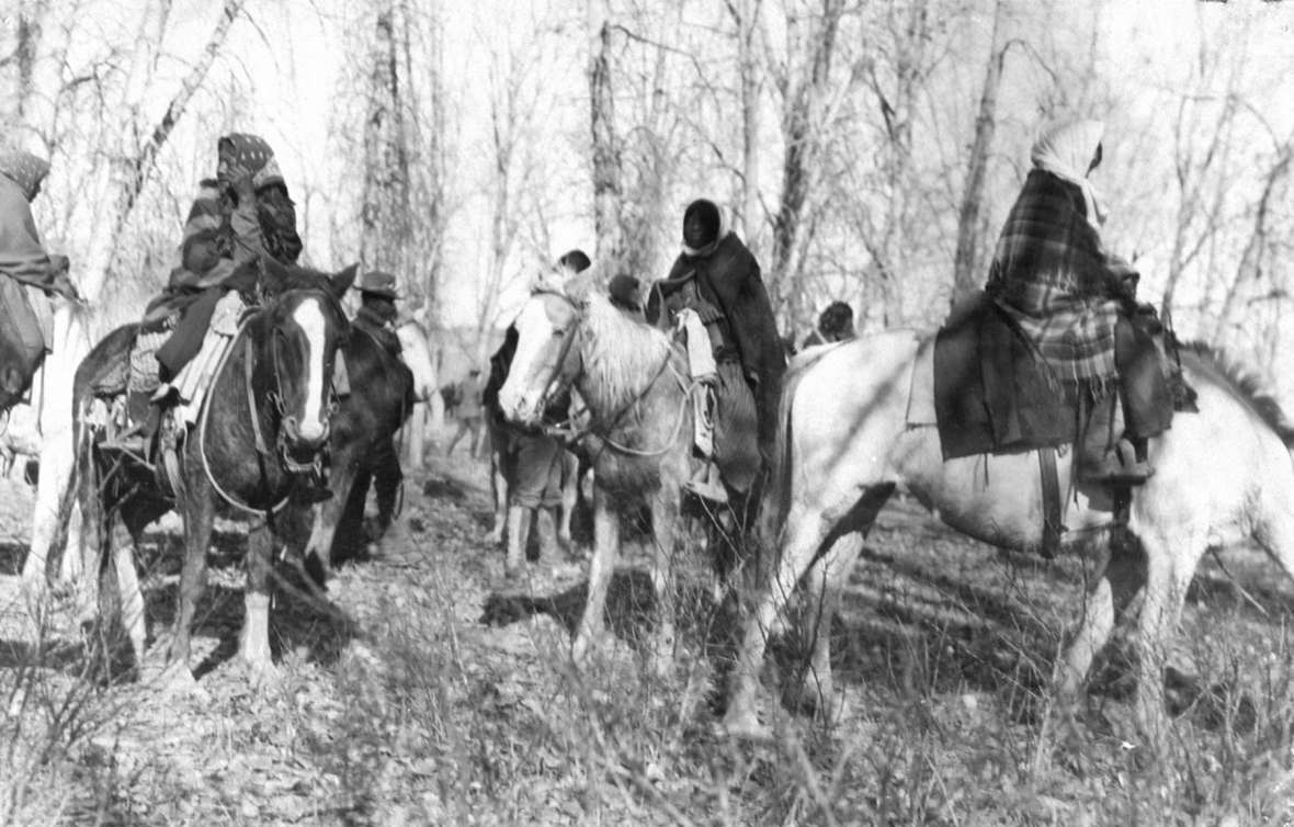 Ute women prepare to leave their camp on Powder River for Fort Meade in South Dakota, November 1906. T.W. Tolman photo, Campbell County Rockpile Museum.