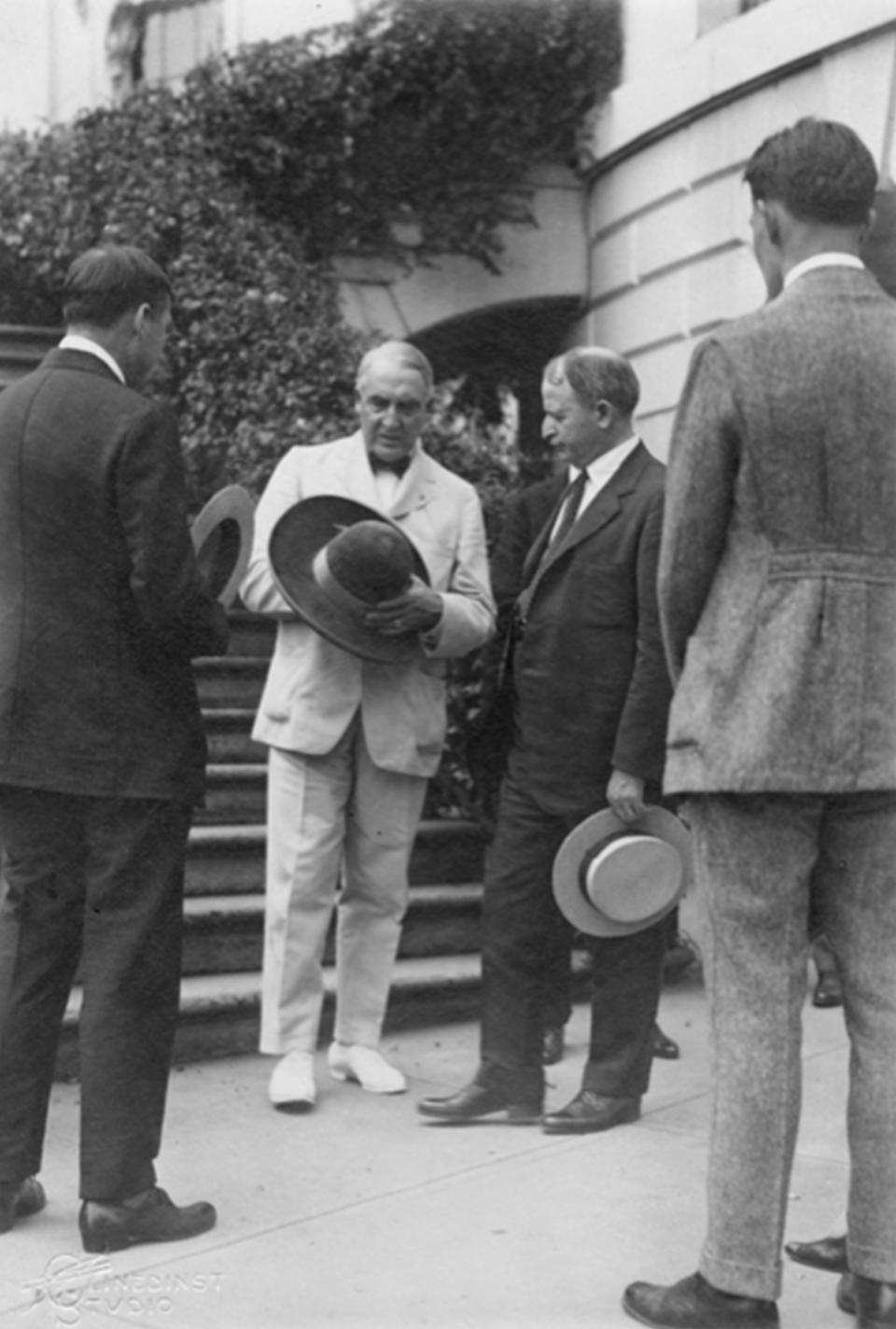 Mondel, center right, with President Warren G. Harding, holding black hat. As the Teapot Dome scandal was about to overwhelm the Harding administration in 1922, Mondell worked hard to get more money in royalties for Wyoming inserted into the corrupt oil lease that was causing all the stir. His bill failed to pass, however. Mondell soon lost a Senate bid but stayed active in Republican Party politics. American Heritage Center.