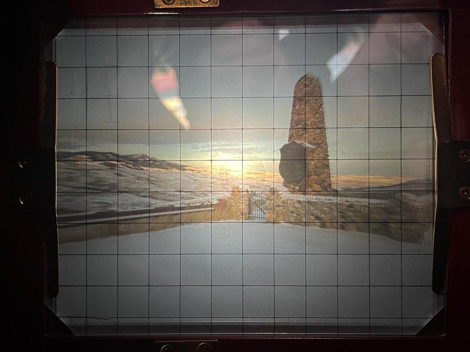 closeup of the image screen on the large-format camera, showing the framing of his image of the Fetterman Monument