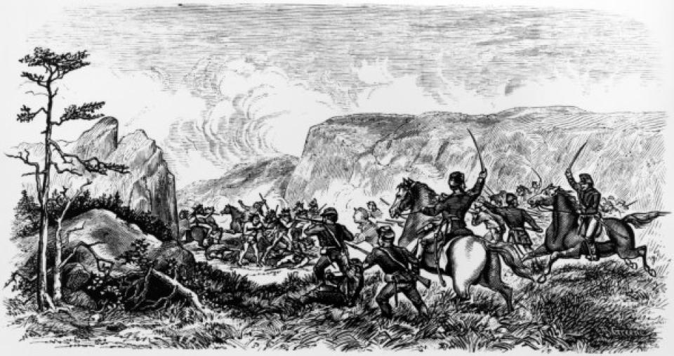illustration of many cavalry soldiers on horseback and on foot, swords raised and guns pointed toward a group of Indigenous people between two cliffs