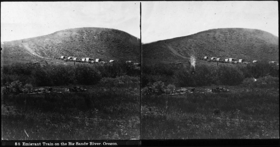 stereograph (two of the same image side-by-side) of a wagon train winding up a treeless hill 