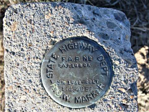 This Federal Aid Project (FAP) marker was found west of Ten Sleep along Washakie County Road 580A, the 1936 route of the Black and Yellow Trail.  ‘FAP No. 108D’ was the number assigned to the road in this area.  Some concrete culverts are also still in place. Authors photo,  2013.