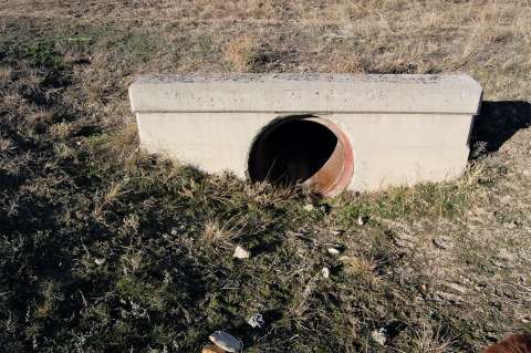 Concrete culverts like this one can still be found along abandoned segments of the Black and Yellow Trail. This culvert is located west of Ten Sleep on Washakie County Road 580A. Authors photo, 2013.