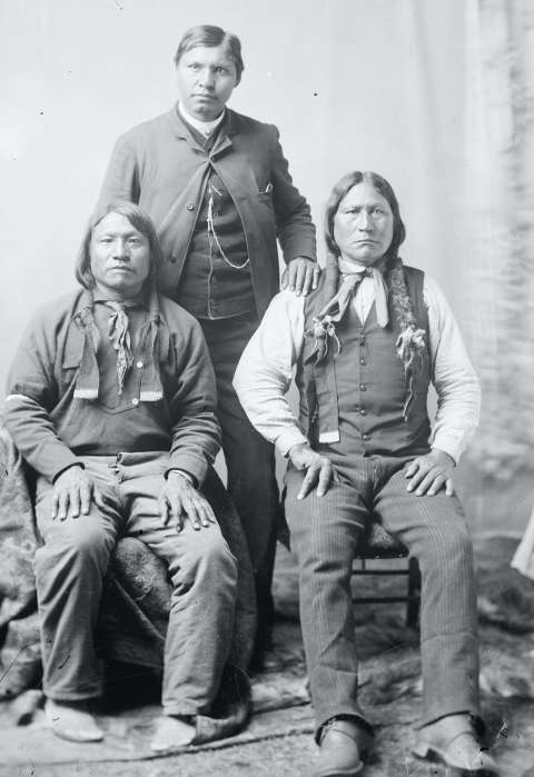 Sherman Coolidge stands with the longtime Arapaho leader Black Coal, right, and Painting Horse. Over the years, Coolidge consistently allied himself with U.S. government agents in their attempts to impose Washington’s will on the Arapaho and Shoshone people. American Heritage Center.