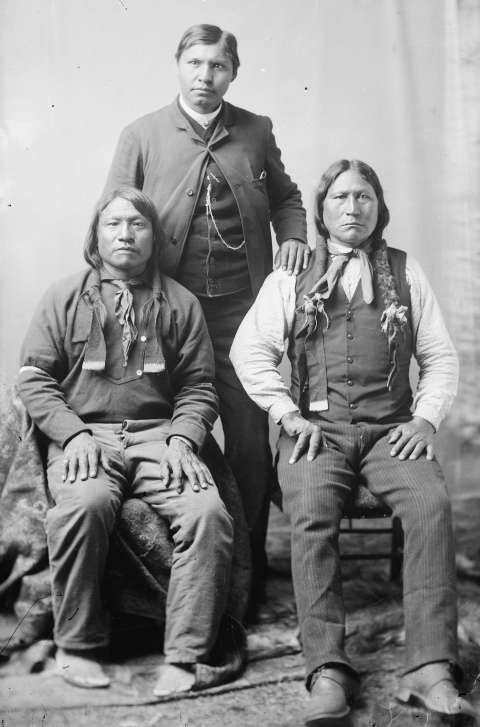 Sherman Coolidge stands with the longtime Arapaho leader Black Coal, right, and Painting Horse. During his time on Wind River, Coolidge consistently allied himself with U.S. government agents in their attempts to impose Washington’s will on the Arapaho and Shoshone people. American Heritage Center.