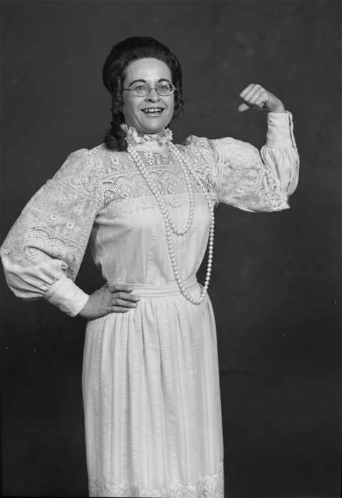 Julia Yelvington strikes a victory pose the spring after the Wyoming Legislature ratified the ERA. After the vote, historian T. A. Larson noted that she 'comes as close as anyone to being indispensable to Wyoming's pro-ERA effort.' Wyoming State Archives.