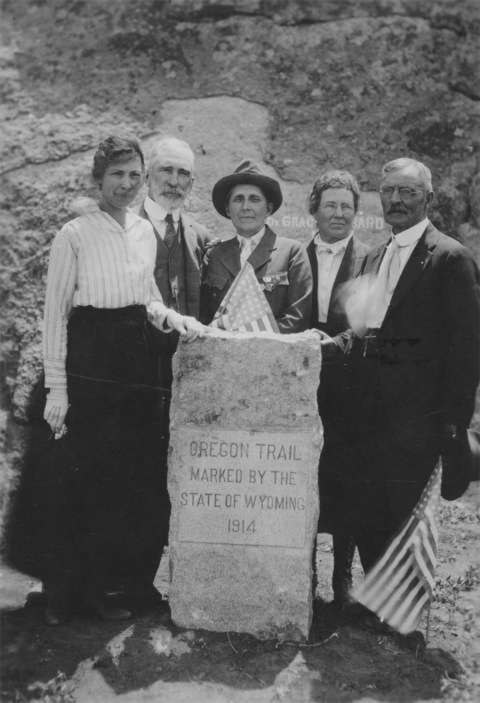 This marker, originally placed near Bessemer Canyon—apparently near what’s now known as the Narrows on Highway 220 south of Casper, miles from the actual Oregon Trail route--was relocated in 1920 to Independence Rock. On hand for the ceremony July 4 were, left to right, Mrs. Tom Cooper, Casper regent, D.A.R.; Former Gov. B.B. Brooks; Grace Raymond Hebard, Oregon Trail Commission; Mrs. B.B. Brooks, state regent, D.A.R.; former frontiersman Fin Burnet. American Heritage Center.