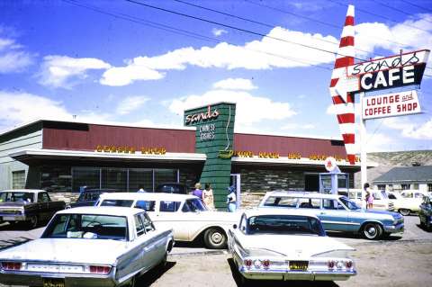 After retiring from the railroad, Finis went into the scenic and commercial postcard business using his own photographs. This one shows the Sands Cafe in Rock Springs in 1965. American Heritage Center. 