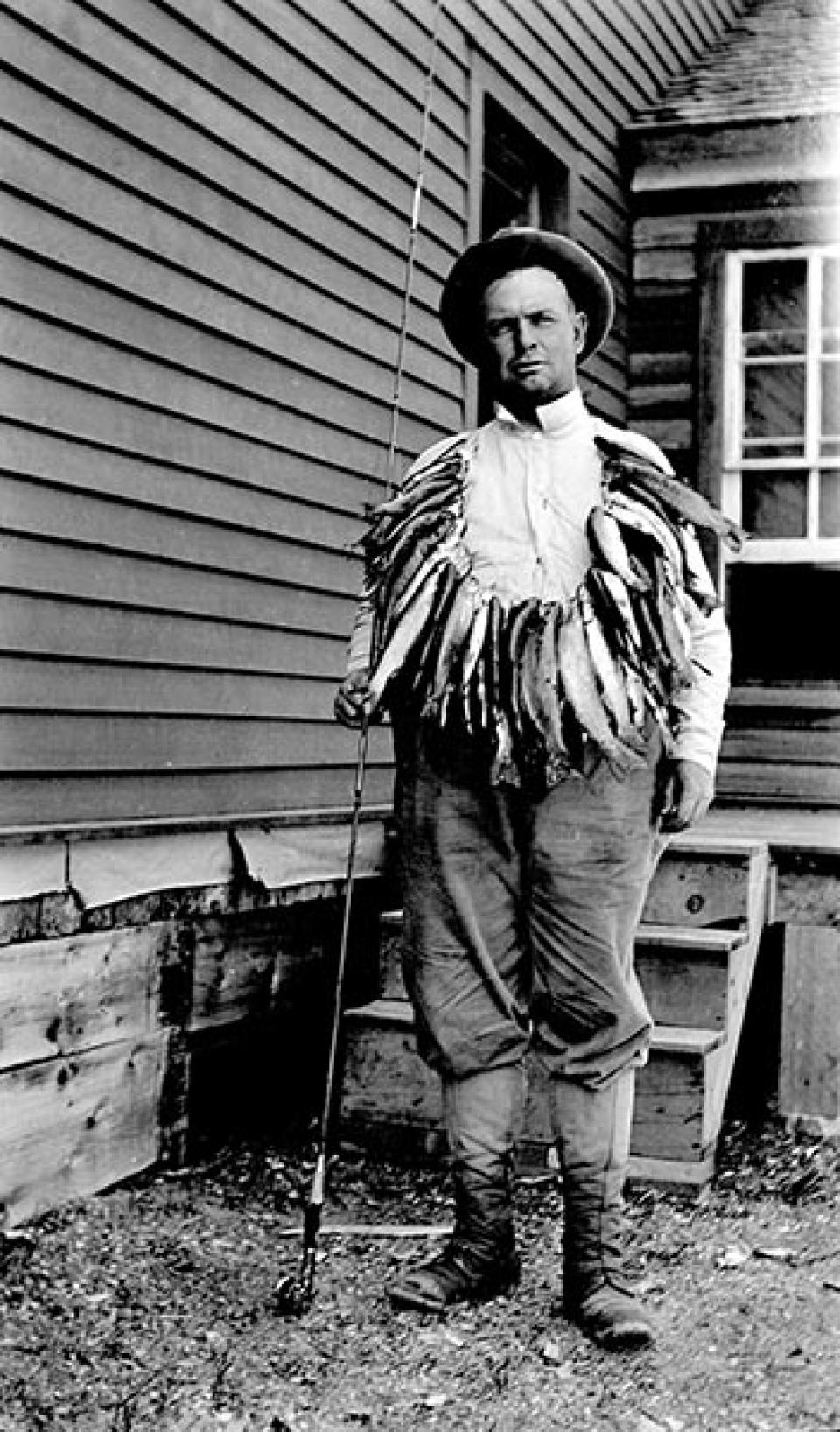 Angler S. McCoy, as Lora identifies him, seems to have had a good day on the river, July 14, 1910. Lora Nichols Collection, Grand Encampment Museum.