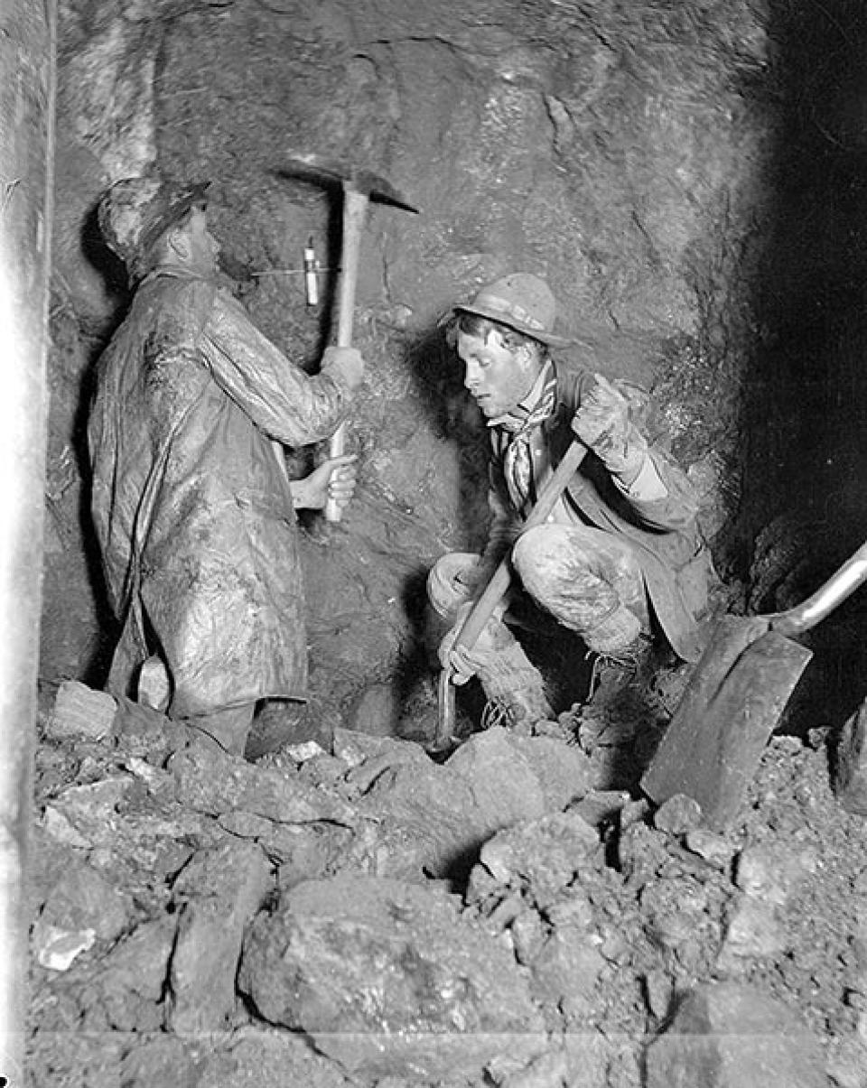 Guy Nichols and Hank Beecher in the tunnel at the Two Toms claim, 1911. Guy Nichols later became Lora's second husband. Lora Nichols collection, Encampment Museum.