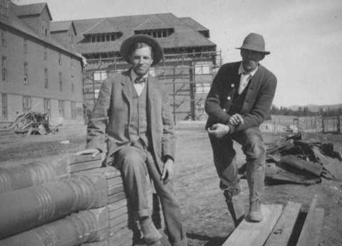 Architect Robert Reamer, left, with his foreman at the Canyon Hotel in Yellowstone in 1910, is most famous for designing the Old Faithful Inn, a remarkable building that blends effectively with its surroundings. NPS photo.