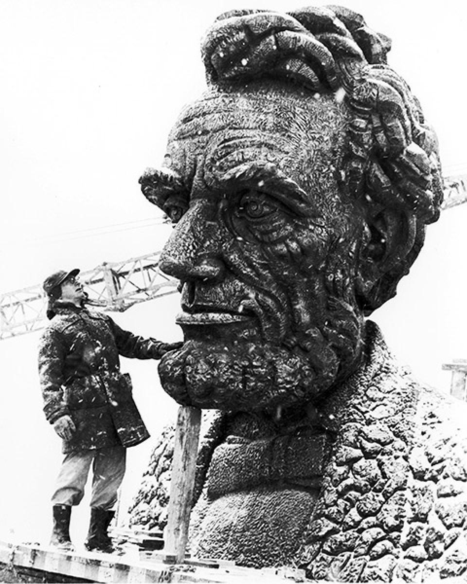 Russin with his Lincoln head at the time of its installation  to commemorate Lincoln's 150th birthday in February 1959, at the highest point on the Lincoln Highway. Randy Wagner photo, American Heritage Center.