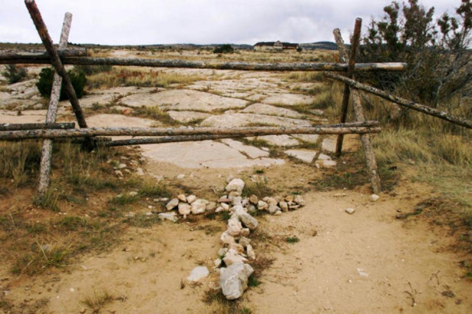 A cross marks the area where University of Wyoming college student Matthew Shepard was beaten and left tied to a fence shortly after midnight on Oct. 7, 1998 in Laramie. He died in a Colorado hospital a week later. The fence has since been torn down. Dan Cepeda, Casper Star-Tribune.