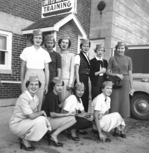 This July 1951 class of stewardesses posed in their new caps in front of the United Air Lines Cheyenne Training Facility. Front row, left to right, Patricia Seibel, unidentified, Mary Morris, Susie Huggins. Back row, fourth from left is Norma Hale, others unidentified. Courtesy Patricia Seibel Romeo.    