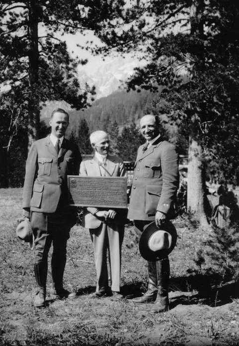 Billy Owen, center, with his first-ascent plaque when the new Grand Teton National Park was dedicated, 1929. At left is National Park Service Supt. Horace Albright; Teton Park Supt. Sam Woodring stands at right. Wyoming State Archives.
