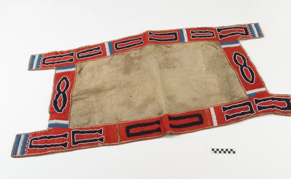 Ute saddle blanket ca. 1855-60 with horseshoe design made of hide, wool cloth, glass pony beads, sinew and cotton thread.  NMAI, Smithsonian Institution, catalog number 8/8055.