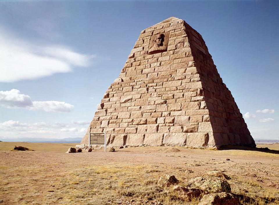 The monument to Oliver and Oakes Ames stands near the abandoned rail line over Sherman Summit. Wikipedia.