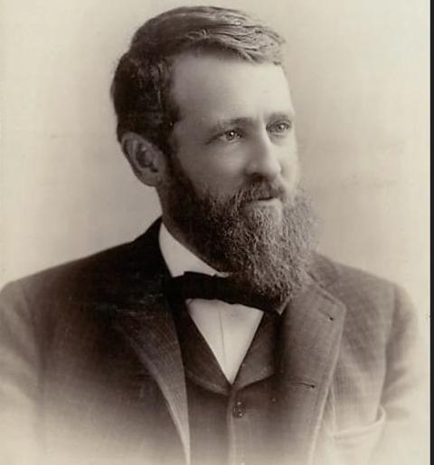 Stephen Wheeler Downey, pioneer Laramie attorney and politician, officially designated the “Father of the University of Wyoming” in 2018 by the UW Board of Trustees. Portrait of bearded man