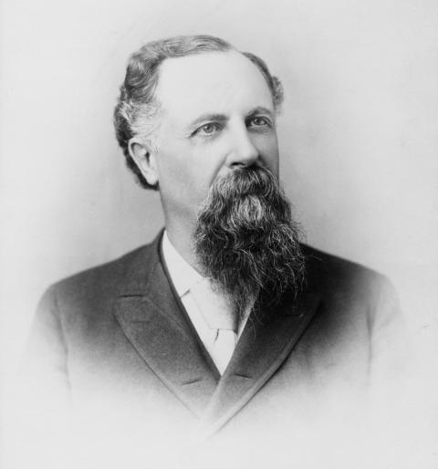 Melville C. Brown, Laramie attorney and politician, president of the 1889 Wyoming Constitutional Convention. Portrait of man with dark long beard and mustache