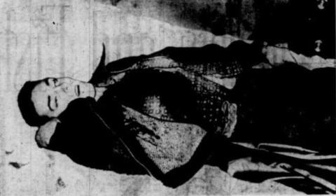 Man lying on his back, dead