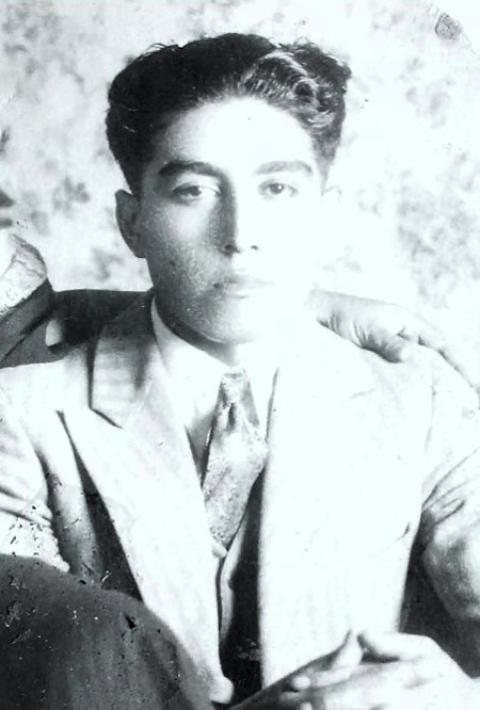 portrait of Carlos Ronquillo Arias in suit coat and tie